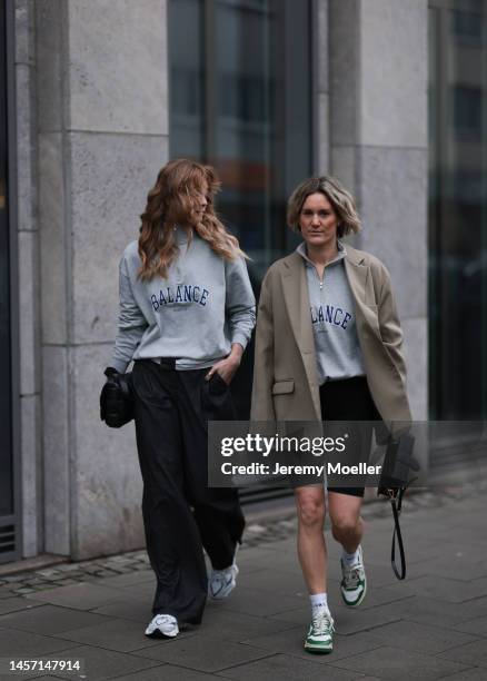 Nadine Berneis seen wearing p&c x Annkathrin Götze black pants and Victoria Thomas seen wearing beige Blazer from The Frankie Shop, a black short...