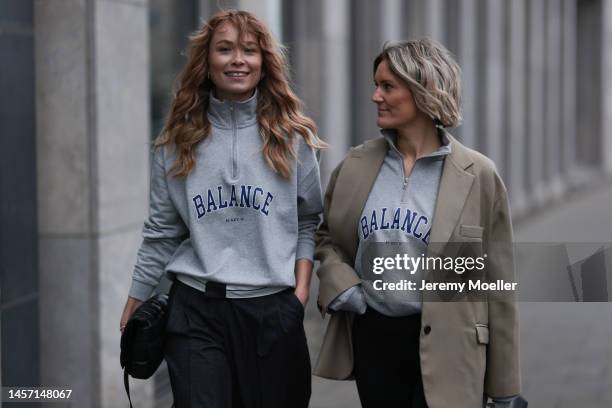 Nadine Berneis seen wearing p&c x Annkathrin Götze black pants and Victoria Thomas seen wearing beige Blazer from The Frankie Shop, a black short...