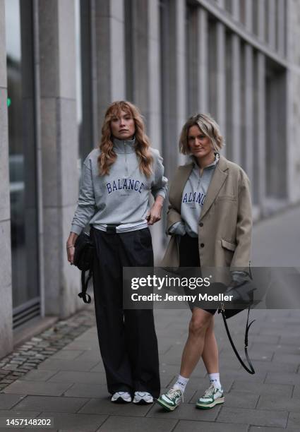 Nadine Berneis seen wearing p&c x Annkathrin Götze black pants and Victoria Thomas seen wearing beige Blazer from The Frankie Shop, a black short...