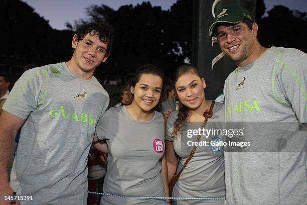 Young fans with Marcell Coetzee and Willem Alberts during the South African national rugby team training session at Northwood Crusaders Rugby Club on...