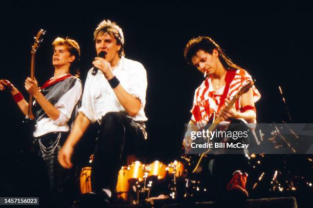 John Taylor, Simon LeBon and Andy Taylor perform live at The Spectrum on March 10, 1984 in Philadelphia, Pennsylvania.