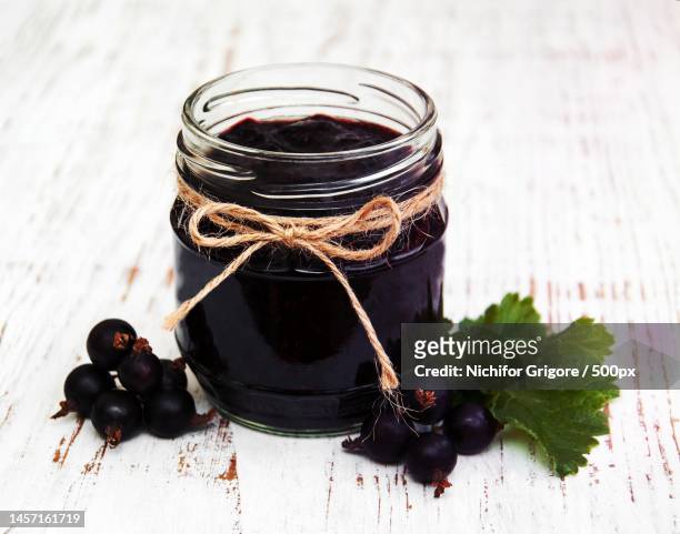 close-up of preserves in jar on table,romania - marmalade stock pictures, royalty-free photos & images