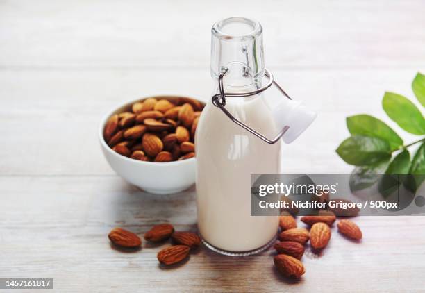 close-up of almonds in jar on table,romania - almond milk stock pictures, royalty-free photos & images