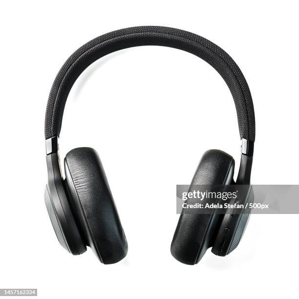 black wireless headphones on a white background overhead,isolated professional-grade headphones fo,romania - kopfhörer stock-fotos und bilder