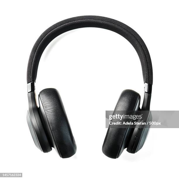 black wireless headphones on a white background overhead,isolated professional-grade headphones fo,romania - earbud stock pictures, royalty-free photos & images