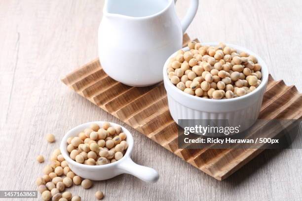 high angle view of beans with soy milk on burlap,bekasi city,west java,indonesia - milchkrug stock-fotos und bilder