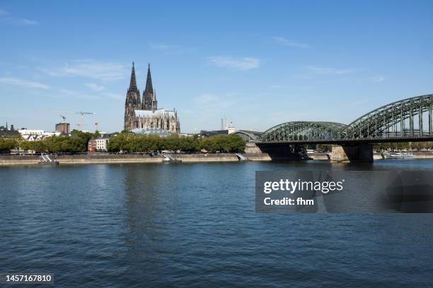 cologne cathedral and hohenzollernbridge (germany) - cologne skyline stock pictures, royalty-free photos & images