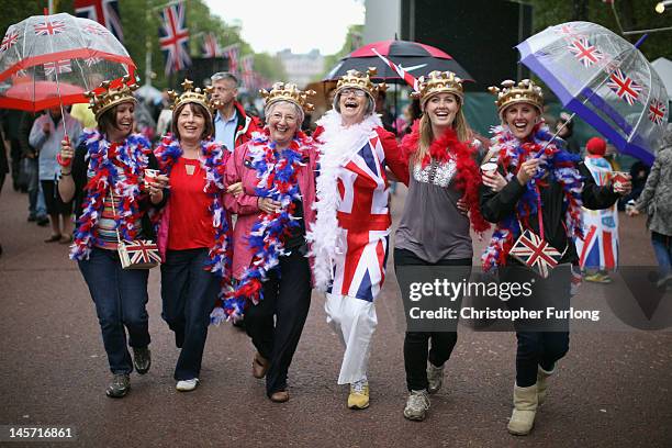 Revellers enjoy the party atmosphere on the The Mall as thousands gather for The Diamond Jubilee Concert on June 4, 2012 in London, England. For only...