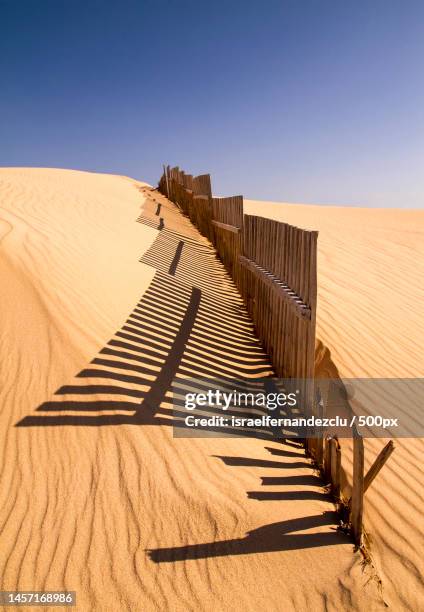 scenic view of desert against clear sky,tarifa,spain - tarifa stock pictures, royalty-free photos & images