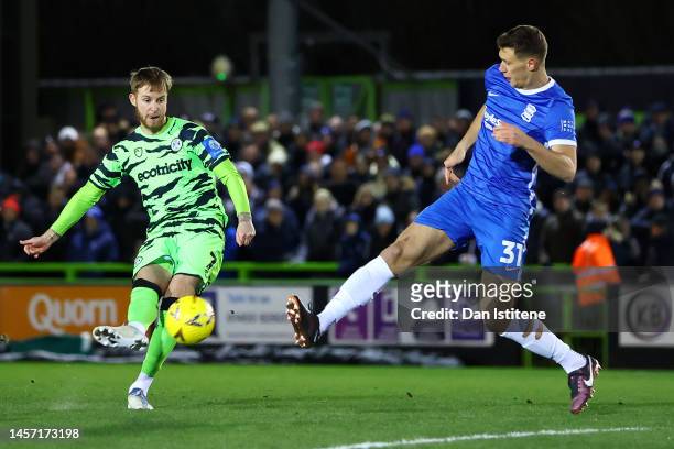 Ben Stevenson of Forest Green Rovers scores the team's first goal while under pressure from Krystian Bielik of Birmingham City during the Emirates FA...