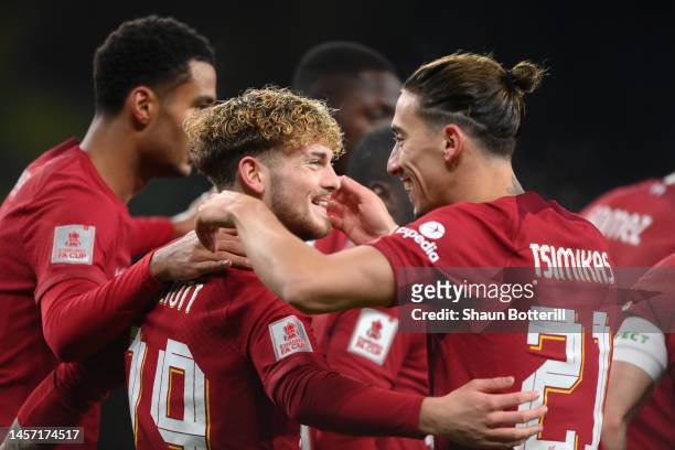 Harvey Elliott of Liverpool celebrates with teammates after scoring the team's first goal during the Emirates FA Cup Third Round Replay match between...