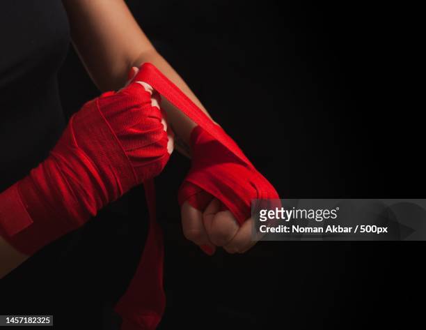 martial arts girl wearing red straps before a fight,pakistan - free fight stock-fotos und bilder