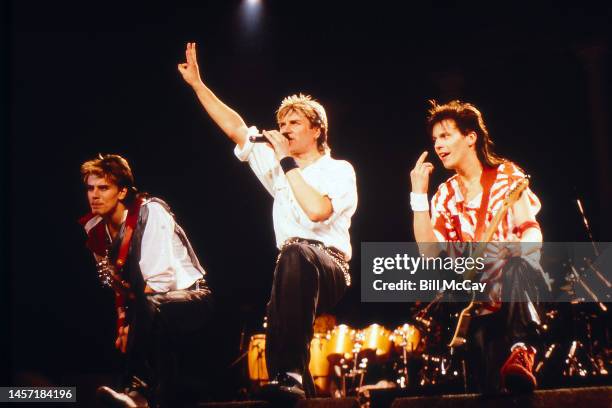 John Taylor, Simon LeBon and Andy Taylor perform live at The Spectrum in Philadelphia, Pennsylvania