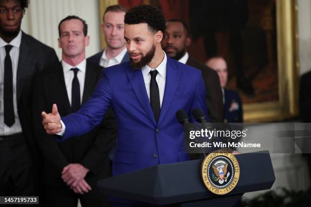 Star Steph Curry speaks during a ceremony honoring the Golden State Warriors in the East Room of the White House January 17, 2023 in Washington, DC....