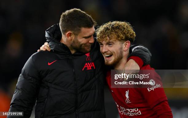 James Milner and Harvey Elliott of Liverpool celebrate following the team's victory in the Emirates FA Cup Third Round Replay match between...