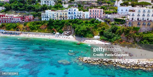 beautiful coastline of capri along the port area. aerial view from drone. - capri stock pictures, royalty-free photos & images