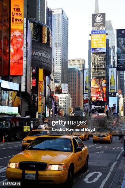 Yellow cabs travels South on Broadway, in New York, New York on MAY 11, 2012.