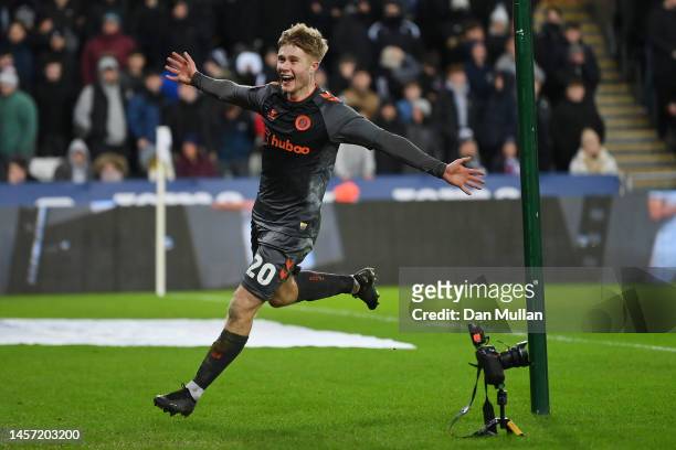 Sam Bell of Bristol City celebrates after scoring the team's second goal during the Emirates FA Cup Third Round Replay match between Swansea City and...
