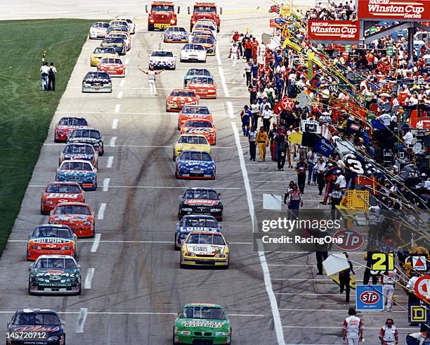 February 15, 1998: The field rolls along pit road at Daytona International Speedway in preparation for the start of the Daytona 500 NASCAR Cup race....