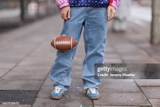 Riccardo Simonetti seen wearing Gucci x Adidas blue sneaker & Gucci x Adidas pink red and blue basketball jacket, Carhartt denim blue jeans, Acne...