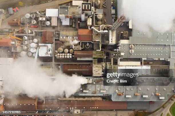 paper mill and smoke from chimneys, aerial view - paper mill stock pictures, royalty-free photos & images