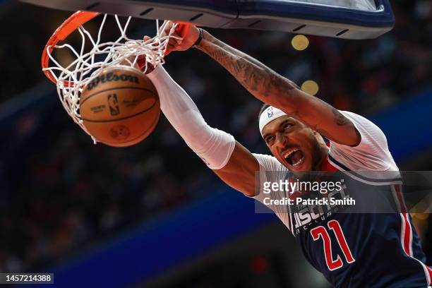 Daniel Gafford of the Washington Wizards dunks against the Golden State Warriors during the second half at Capital One Arena on January 16, 2023 in...
