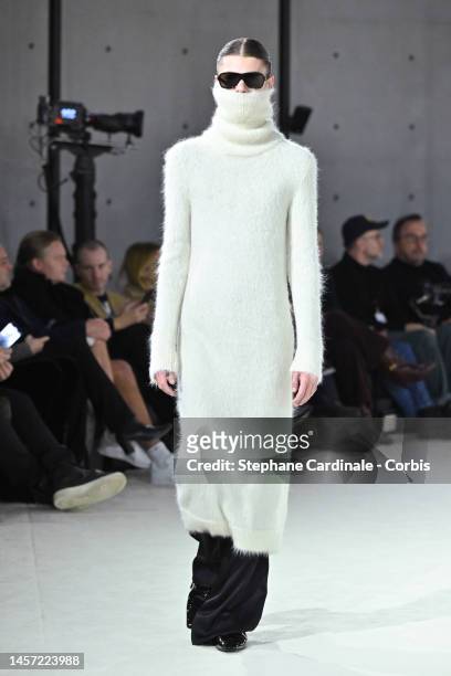 Model walks the runway during the Saint Laurent Menswear Fall-Winter 2023-2024 show as part of Paris Fashion Week on January 17, 2023 in Paris,...