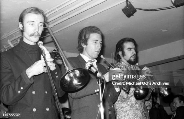 Dick Halligan, Jerry Weiss and Randy Brecker of the rock and roll band "Blood, Sweat And Tears" perform onstage at Steve Paul's The Scene nightclub...