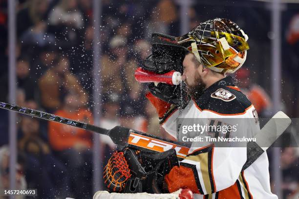 Anthony Stolarz of the Anaheim Ducks takes a drink during the second period against the Philadelphia Flyers at Wells Fargo Center on January 17, 2023...