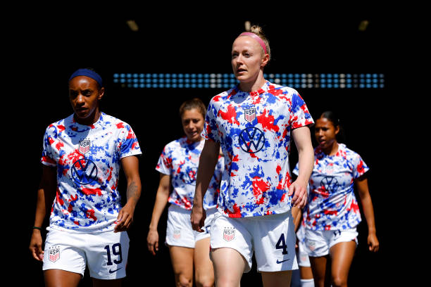Crystal Dunn and Becky Sauerbrunn of USA take the field to warm up during the International friendly fixture match between the New Zealand Football...