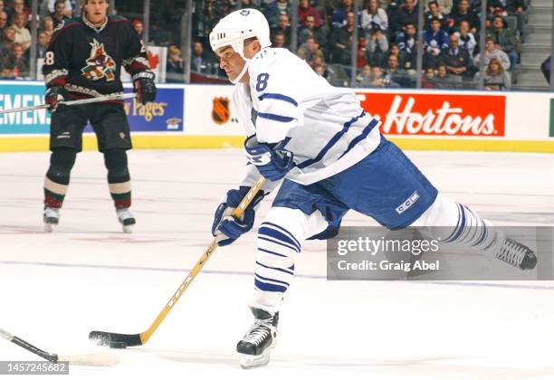 Tie Domi of the Toronto Maple Leafs skates against the Phoenix Coyotes during NHL game action on October 17, 2002 at Air Canada Centre in Toronto,...