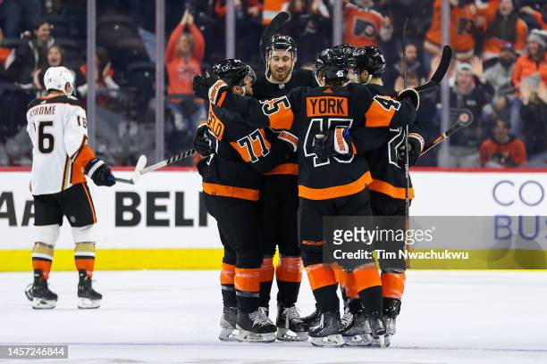 Kevin Hayes of the Philadelphia Flyers celebrates with teammates after scoring for a Hat Trick during the third period against the Anaheim Ducks at...
