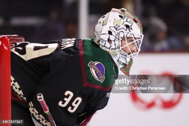 Goaltender Connor Ingram of the Arizona Coyotes looks down ice during the first period of the NHL game against the Detroit Red Wings at Mullett Arena...