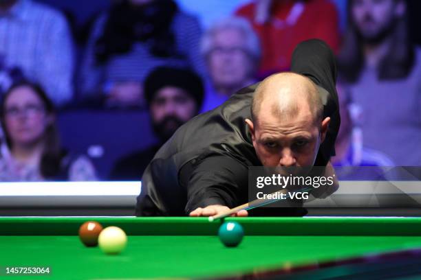 Barry Hawkins of England plays a shot during the first round match against Ronnie O'Sullivan of England on day two of the 2023 Duelbits World Grand...