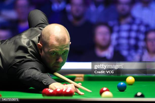 Barry Hawkins of England plays a shot during the first round match against Ronnie O'Sullivan of England on day two of the 2023 Duelbits World Grand...