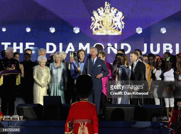 The Prince of Wales makes a speech as HM Queen Elizabeth II, The Duchess of Cornwall, Sir Paul McCartney, Gary Barlow and artists listen on stage...