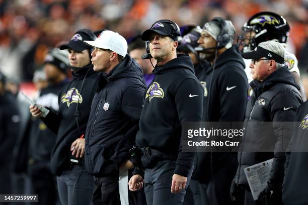 Head coach John Harbaugh of the Baltimore Ravens looks on against the Cincinnati Bengals during the AFC Wild Card playoff game at Paycor Stadium on...