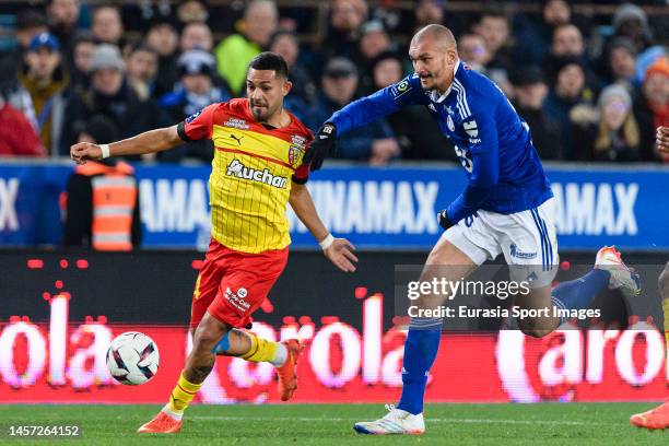 Facundo Medina of Lens plays against Ludovic Ajorque of RC Strasbourg during the Ligue 1 match between RC Strasbourg and RC Lens at Stade de la...