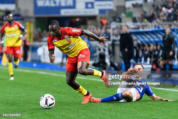 Lucas Perrin of RC Strasbourg battles for the ball with Deiver Machado of Lens during the Ligue 1 match between RC Strasbourg and RC Lens at Stade de...