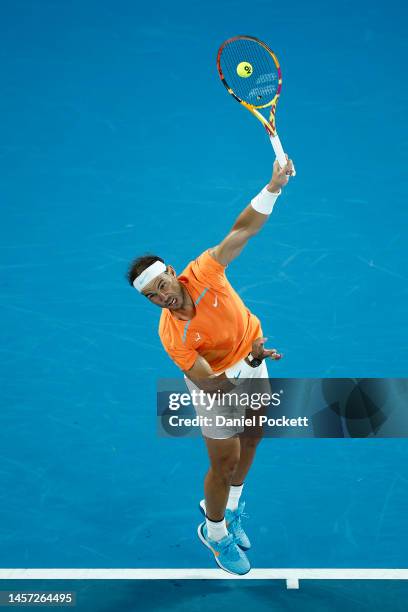 Rafael Nadal of Spain serves in their round two singles match against Mackenzie McDonald of the United States during day three of the 2023 Australian...