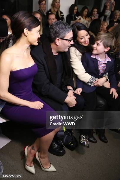 Carla Gugino, Jason Weinberg, Lucy Liu and Jasper Weinberg in the front row