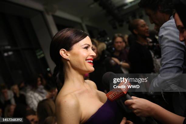 Carla Gugino in the front row