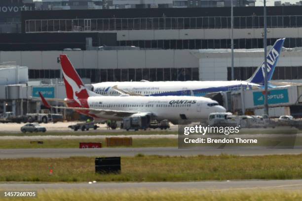 Qantas flight QF144 berths at a gate at Sydney Airport on January 18, 2023 in Sydney, Australia. Emergency services were on standby at Sydney Airport...