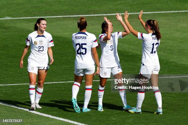Mallory Swanson of USA celebrates with Alex Morgan after scoring a goal during the International friendly fixture match between the New Zealand...