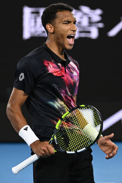 Felix Auger-Aliassime of Canada celebrates match point in their round two singles match against Alex Molcan of Slovakia during day three of the 2023...