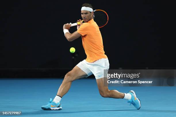 Rafael Nadal of Spain plays a backhand in their round two singles match against Mackenzie McDonald of the United States during day three of the 2023...