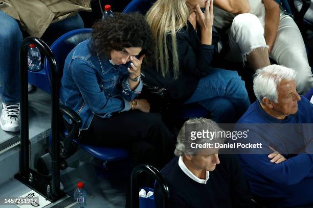 Maria Francisca Perello looks on from the players box of Rafael Nadal of Spain during the round two singles match against Mackenzie McDonald of the...