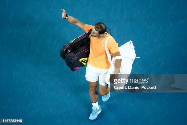 Rafael Nadal of Spain acknowledges the crowd after losing their round two singles match against Mackenzie McDonald of the United States during day...