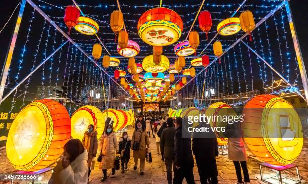 People visit a lantern show at a tourist attraction ahead of the Chinese New Year, the Year of the Rabbit, on January 17, 2023 in Yuncheng, Shanxi...