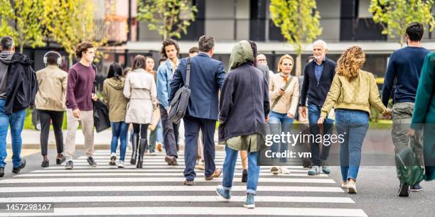 Rear View Diverse Crowd Photos and Premium High Res Pictures - Getty Images